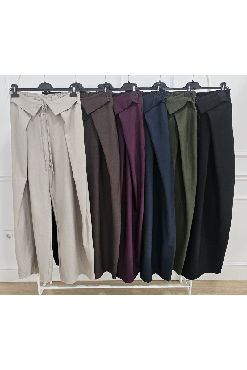 Pantalón pinzas invertidas vuelta