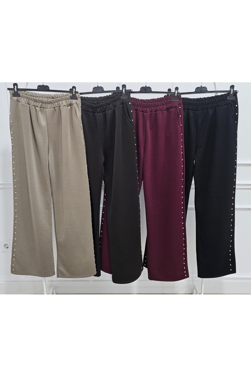 Pantalón sport tacha