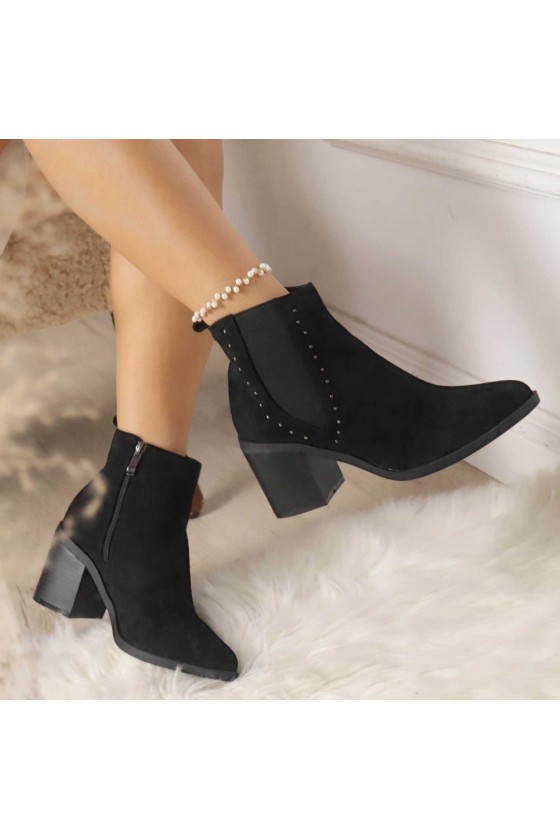 Botín elástico tacha