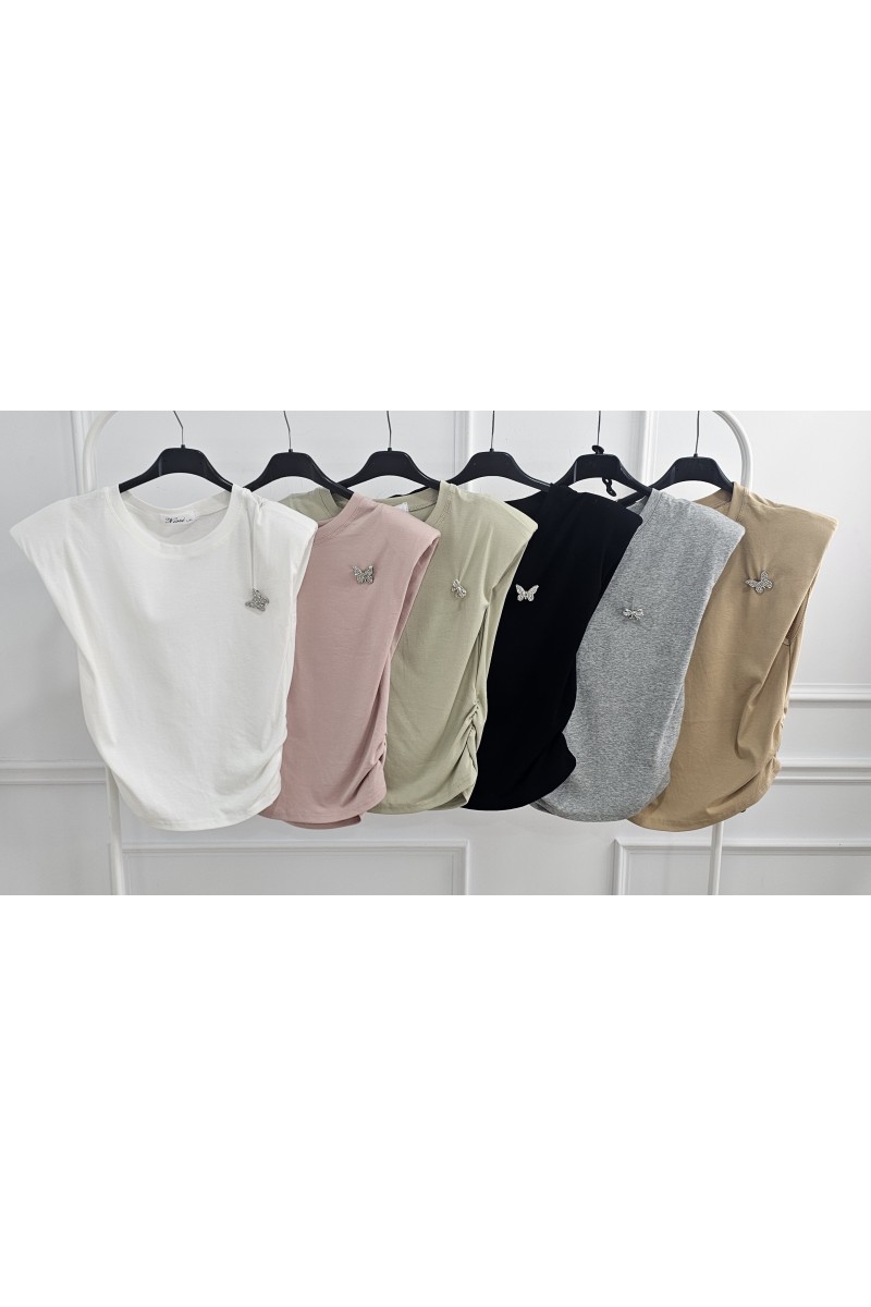 Camiseta hombreras broche brillo