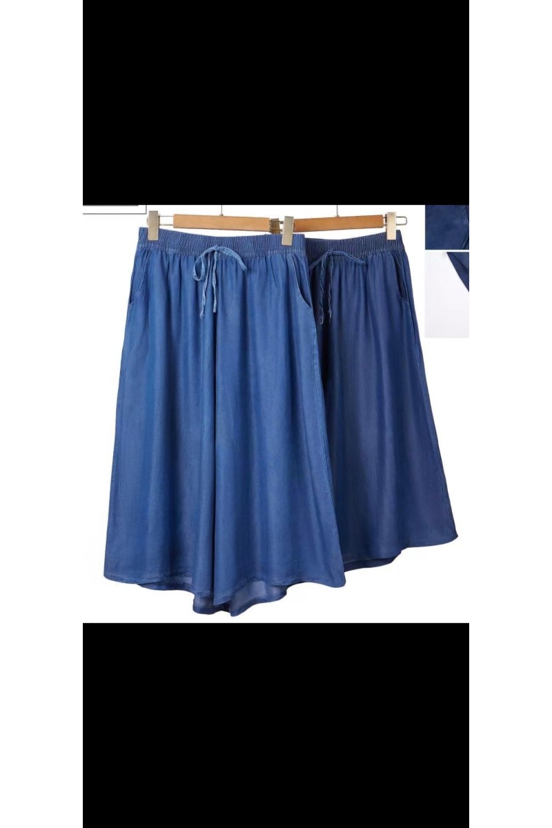 Pantalón denim midi palazzo